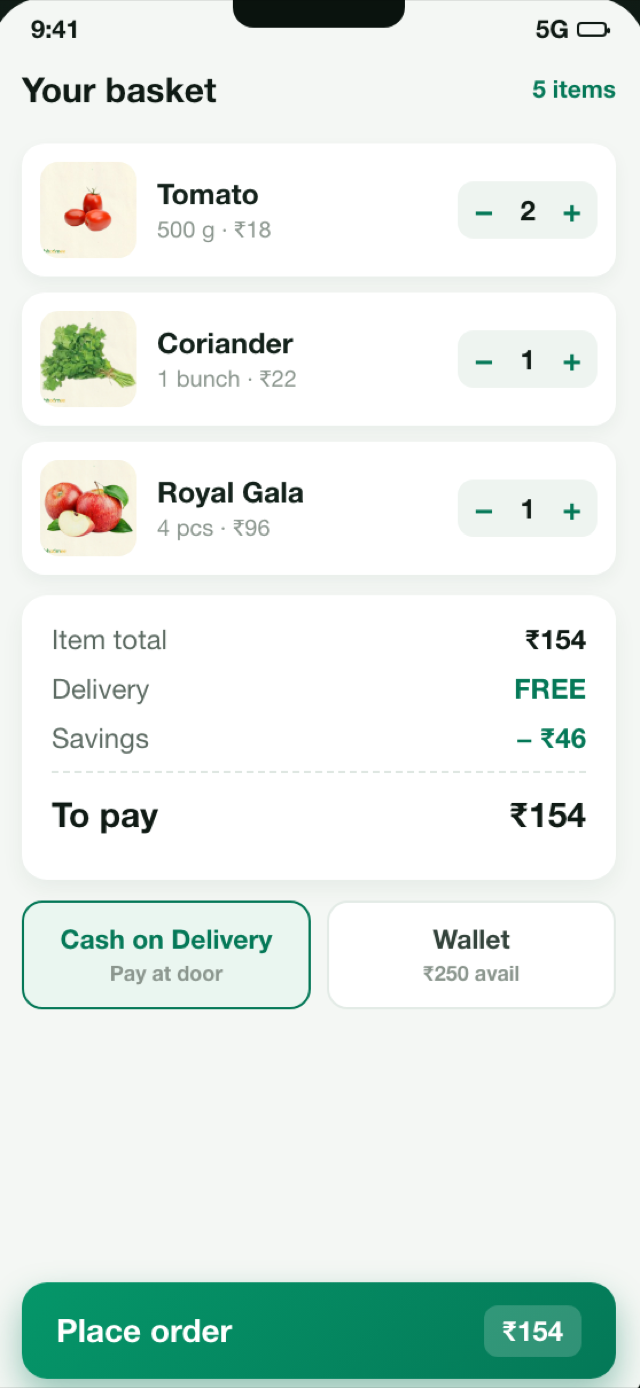 Bhoomee Store app checkout screen — basket with tomato, coriander and apples, free delivery and Place Order button